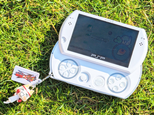 PSP Go White Console + Micro SD Card Mod + Toro Inoue Keychain