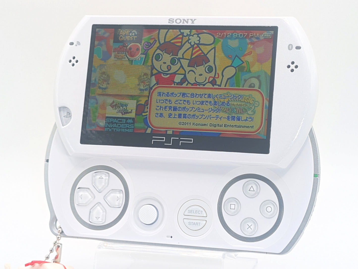 PSP Go White Console + Micro SD Card Mod + Toro Inoue Keychain