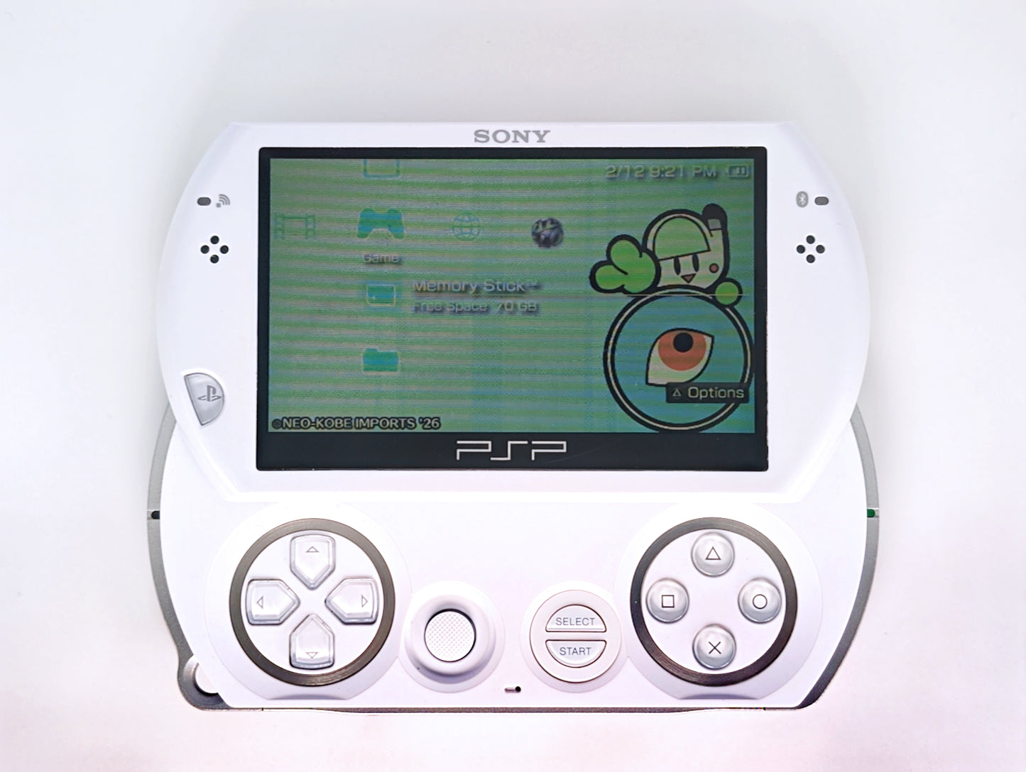 PSP Go White Console + Micro SD Card Mod + Toro Inoue Keychain